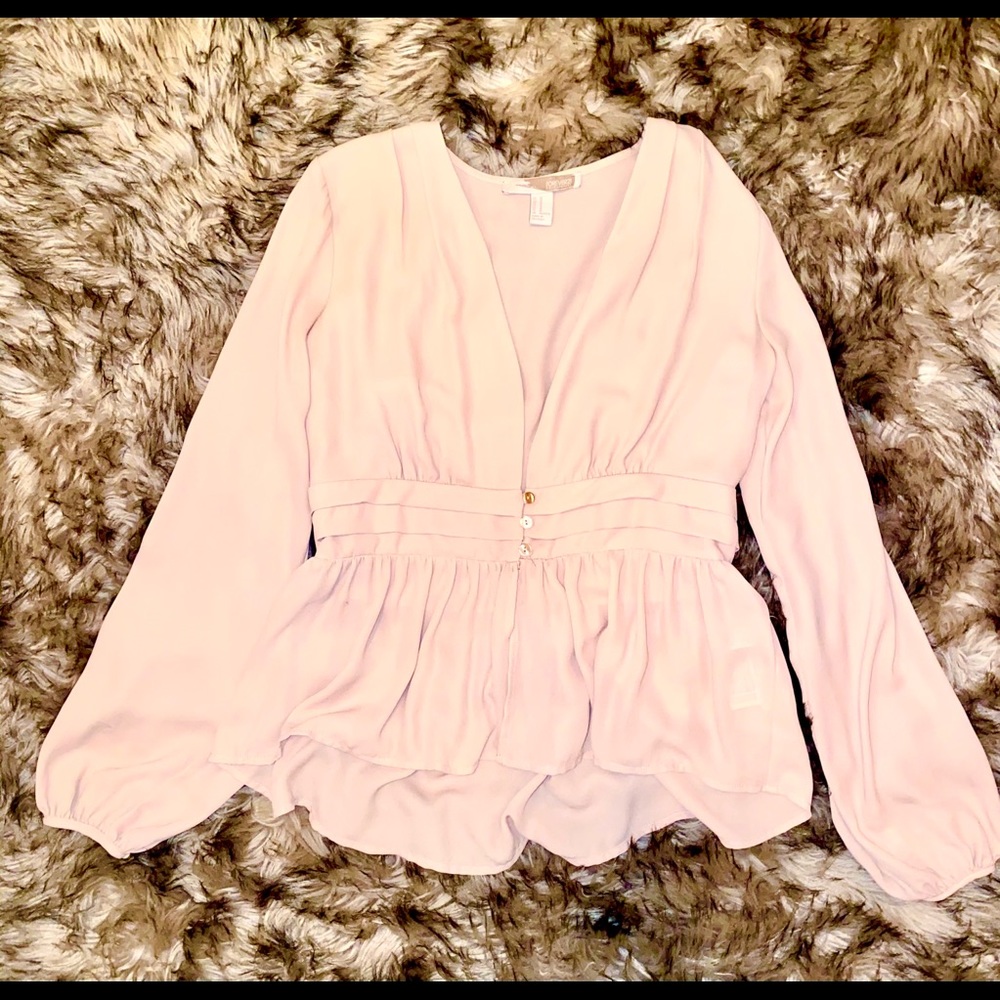 Woman’s Pink Peplum Blouse